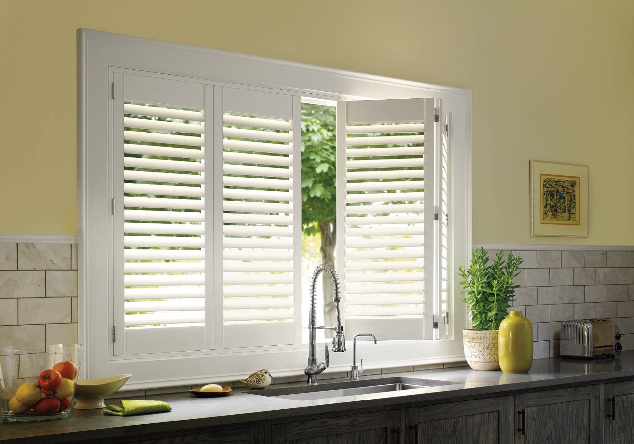 Hunter Douglas Palm Beach™ Polysatin™ Vinyl Shutters in a kitchen near Arvada, Colorado (CO)